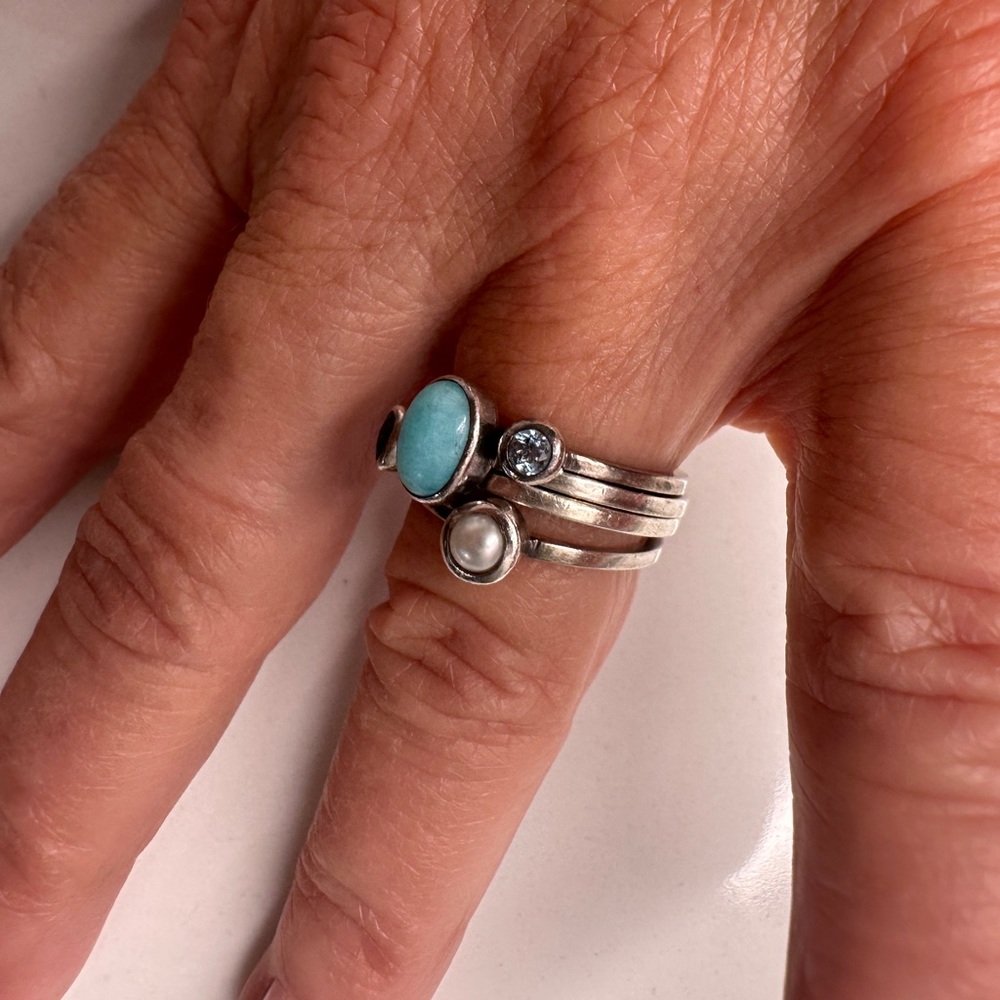 Set of four sterling silver stacking rings by Pandora